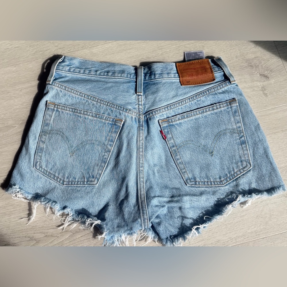 Levi's Light Wash Frayed Hem Denim Shorts